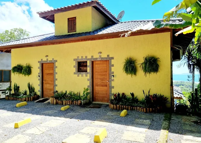 Burung Flats Itamambuca - Hospedagem com vista para o mar